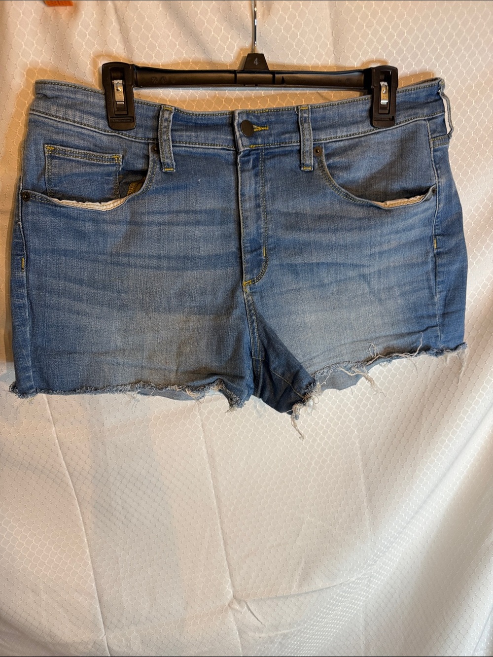 Universal Thread light was Jean shorts in a size 14.